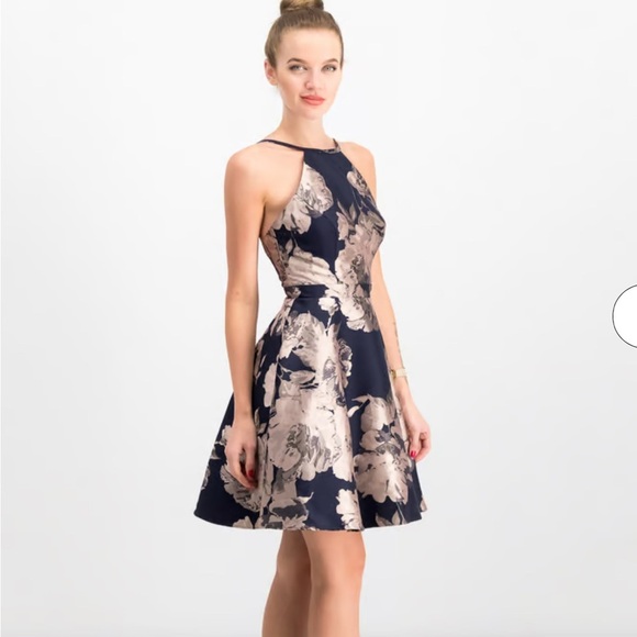 Xscape
Women Printed Open,Back Fit, Flare Floral, Navy, Cream Halter Dress Sz10 - Picture 2 of 12